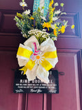 Spring over the door hanging wreath